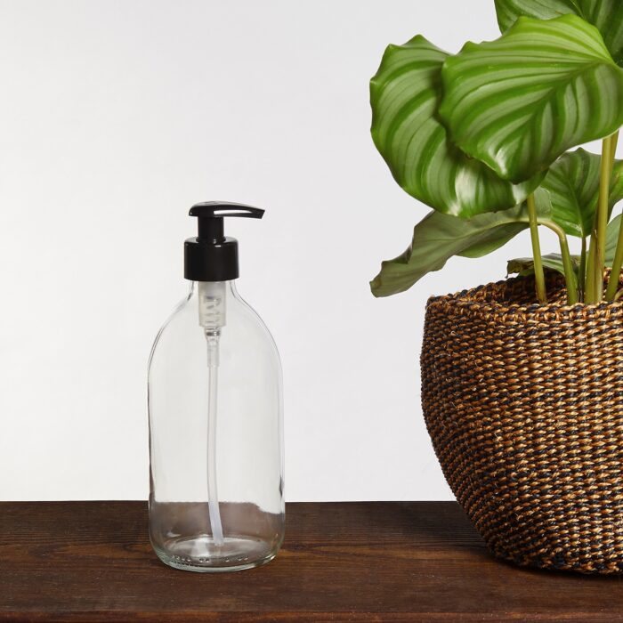Clear glass soap dispenser bottle